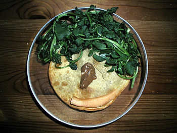 Smiling Tostada: corn tortilla, watercress, almond butter, cantaloupe